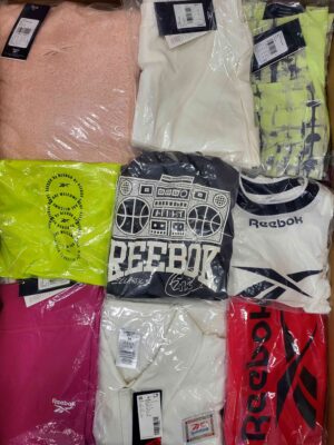 The photo shows a package with clothing in the category R.