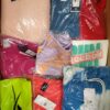 The photo shows a package with clothing in the category R.