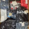 The photo shows a package with clothing in the category AM.