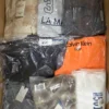 The photo shows a package with clothing in the category AM.