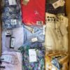 The photo shows a package with clothing in the category AR.