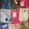 The photo shows a package with clothing in the category AR.