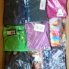 The photo shows a package with clothing in the category AR.