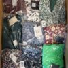 The photo shows a package with clothing in the category AR.
