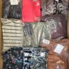 The photo shows a package with clothing in the category AR.