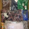 The photo shows a package with clothing in the category AR.