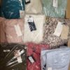 The photo shows a package with clothing in the category AR.