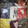 The photo shows a package with clothing in the category AR.