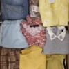 The photo shows a package with clothing in the category TSC.