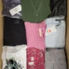 The photo shows a package with clothing in the category TSC.