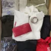 The photo shows a package with clothing in the category TSC.