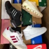 The photo shows a package with footwear in the category CS.