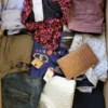 The photo shows a package with clothing in the category TSC.
