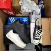 The photo shows a package with footwear in the category CS.