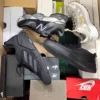 The photo shows a package with footwear in the category CS.