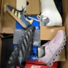 The photo shows a package with footwear in the category CS.