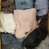 TSC640 1 The photo shows a package with clothing in the category TSC.