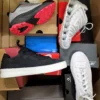 The photo shows a package with footwear in the category CS.