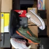 The photo shows a package with footwear in the category CS.