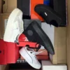 The photo shows a package with footwear in the category CS.