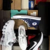 The photo shows a package with footwear in the category CS.