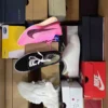 The photo shows a package with footwear in the category CS.