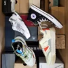 The photo shows a package with footwear in the category CS.
