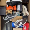The photo shows a package with footwear in the category CS.