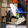 The photo shows a package with footwear in the category CS.