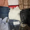 The photo shows a package with clothing in the category TSC.