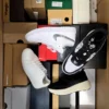The photo shows a package with footwear in the category CS.