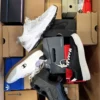 The photo shows a package with footwear in the category CS.