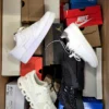 The photo shows a package with footwear in the category CS.