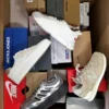 The photo shows a package with footwear in the category CS.