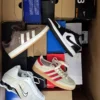The photo shows a package with footwear in the category CS.