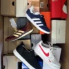 The photo shows a package with footwear in the category CS.