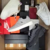 The photo shows a package with footwear in the category CS.