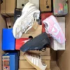 The photo shows a package with footwear in the category CS.