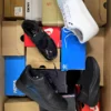 The photo shows a package with footwear in the category CS.