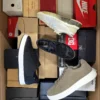 The photo shows a package with footwear in the category CS.
