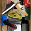The photo shows a package with footwear in the category CS.