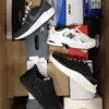 The photo shows a package with footwear in the category CS.