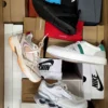 The photo shows a package with footwear in the category CS.