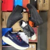 The photo shows a package with footwear in the category CS.