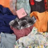 The photo shows a package with clothing in the category SN.