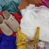 The photo shows a package with clothing in the category SN.