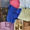 The photo shows a package with clothing in the category SN.
