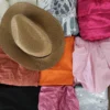 The photo shows a package with clothing in the category SN.