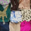 The photo shows a package with clothing in the category SN.