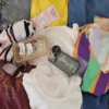 The photo shows a package with clothing in the category SN.